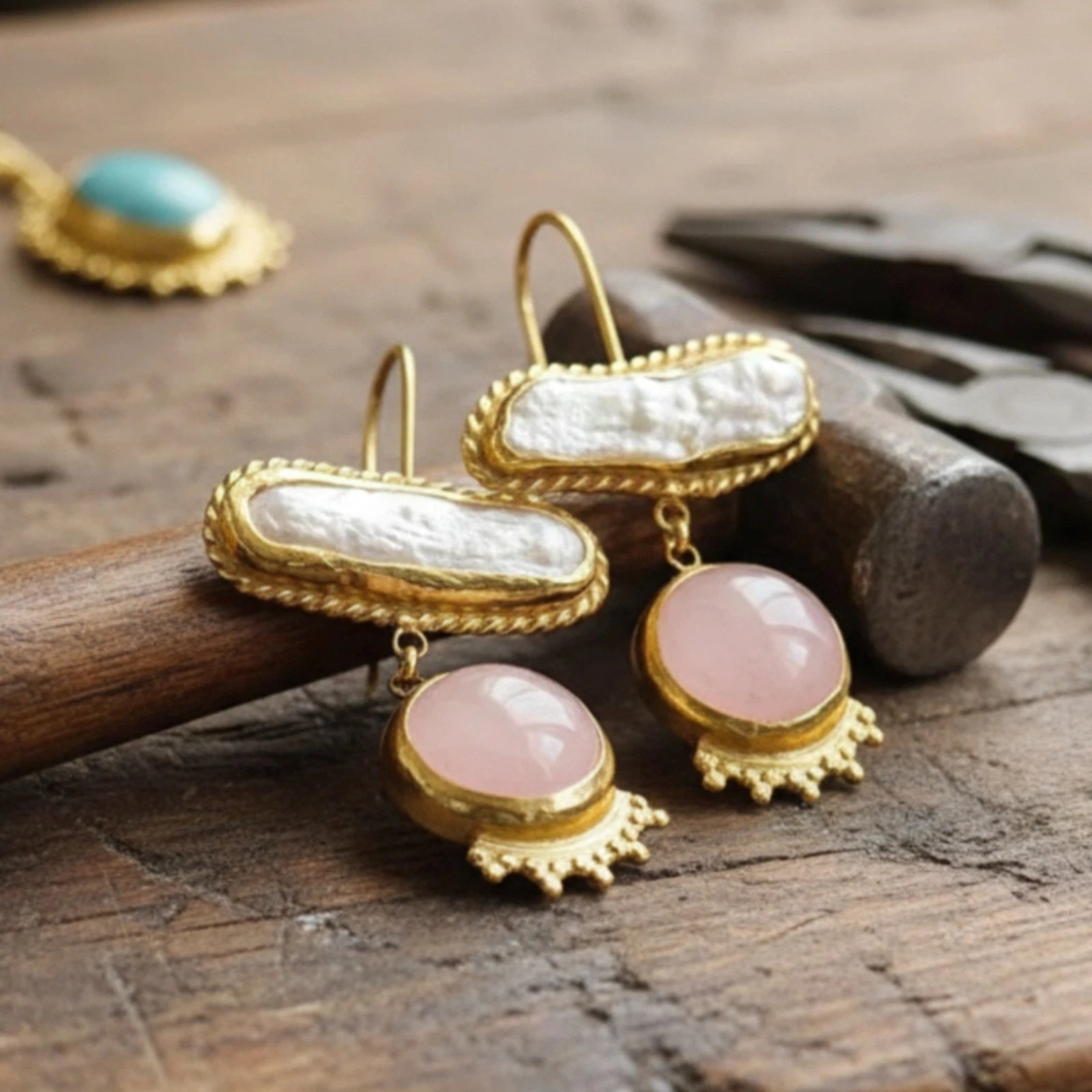 Handmade pearl pink quartz earrings detail showing artisan craftsmanship and natural gemstone setting
