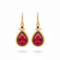 Red Topaz drop earrings handcrafted by designer Sultan in Bodrum atelier, 925 sterling silver Turkish jewelry symbolizing vitality and passion
