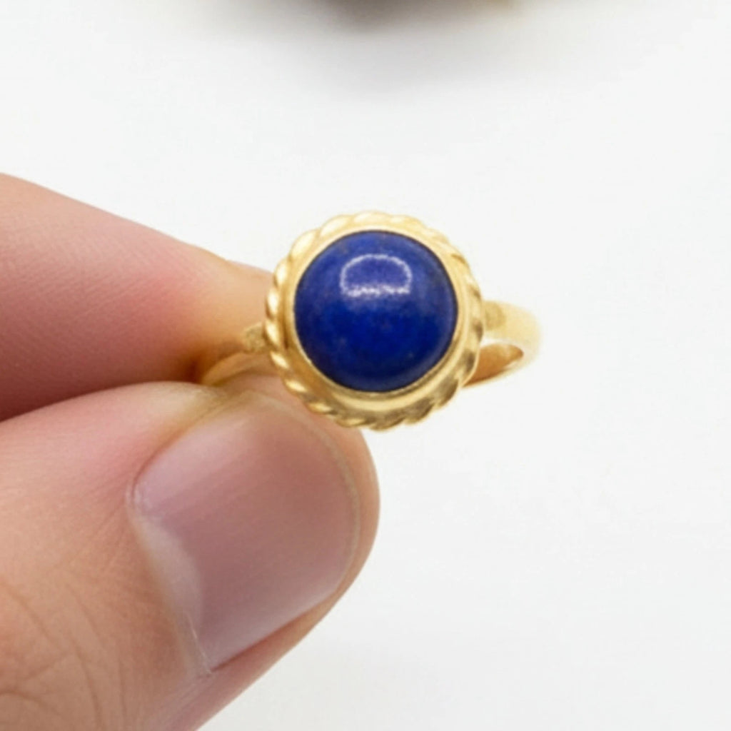 925 silver Lapis Lazuli ring featuring ancient Roman-inspired design by artisan Sultan, Bodrum Turkish jewelry with hammered texture and wisdom symbol