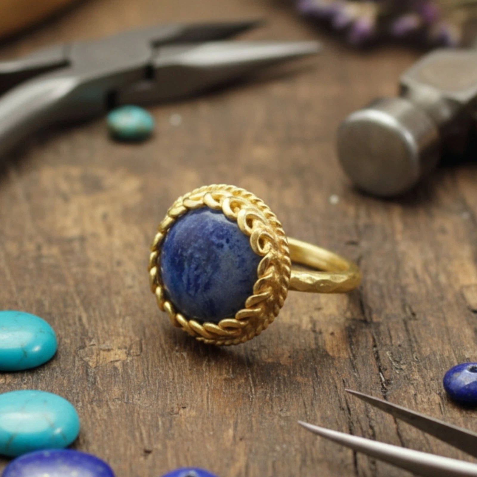 925 silver Lapis Lazuli ring featuring hammered texture by artisan Sultan, Bodrum Turkish jewelry with timeless elegance and wisdom